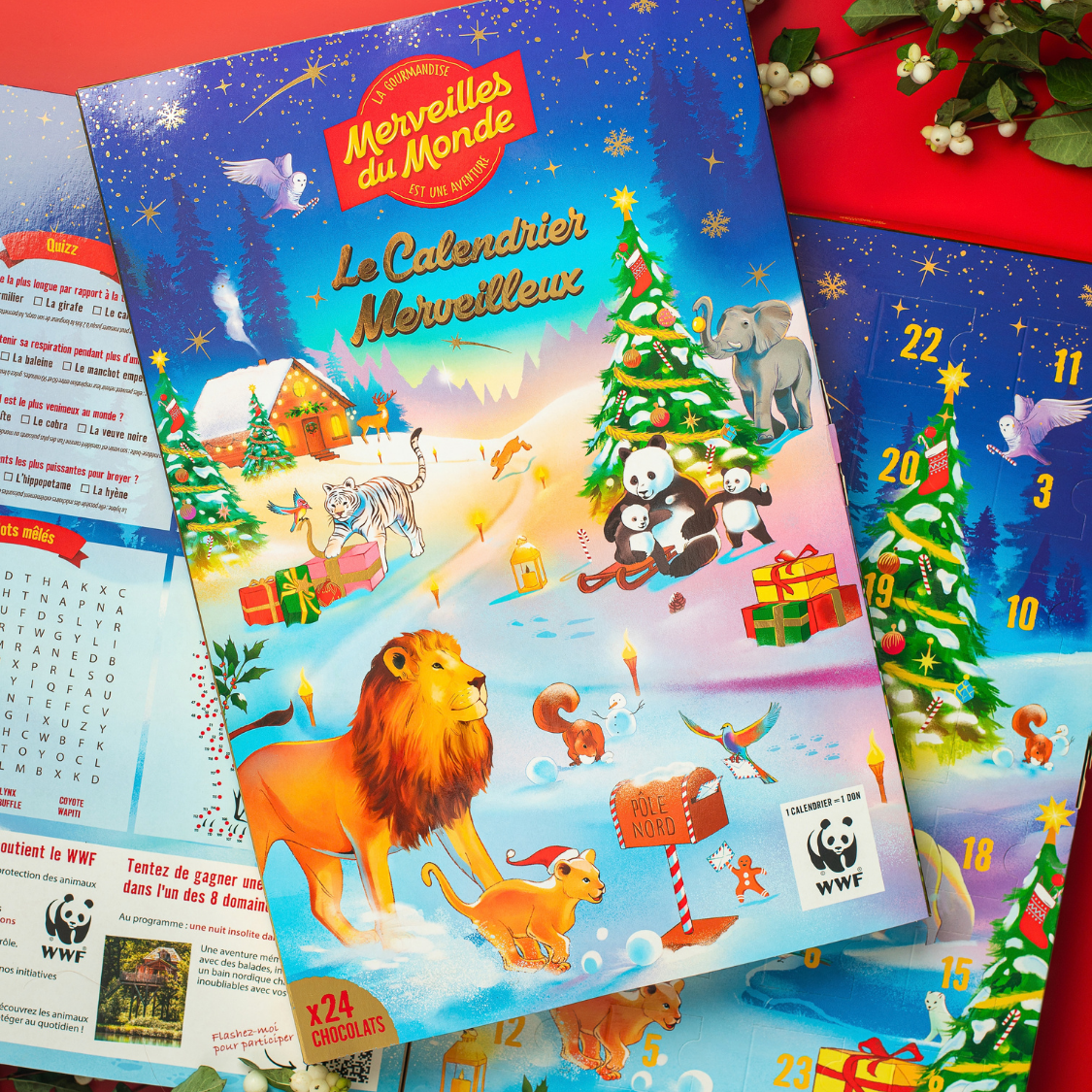 Vivez la magie de Noël avec le Calendrier de l’Avent Merveilles du Monde ! Derrière chaque case se cache une délicieuse surprise au chocolat au lait : 11 boules au cœur fondant aux éclats de noisettes et d’amandes, 12 animaux au chocolat au lait praliné aux amandes et noisettes hachées, et une barre chocolatée au chocolat au lait aux amandes et noisettes hachées. 