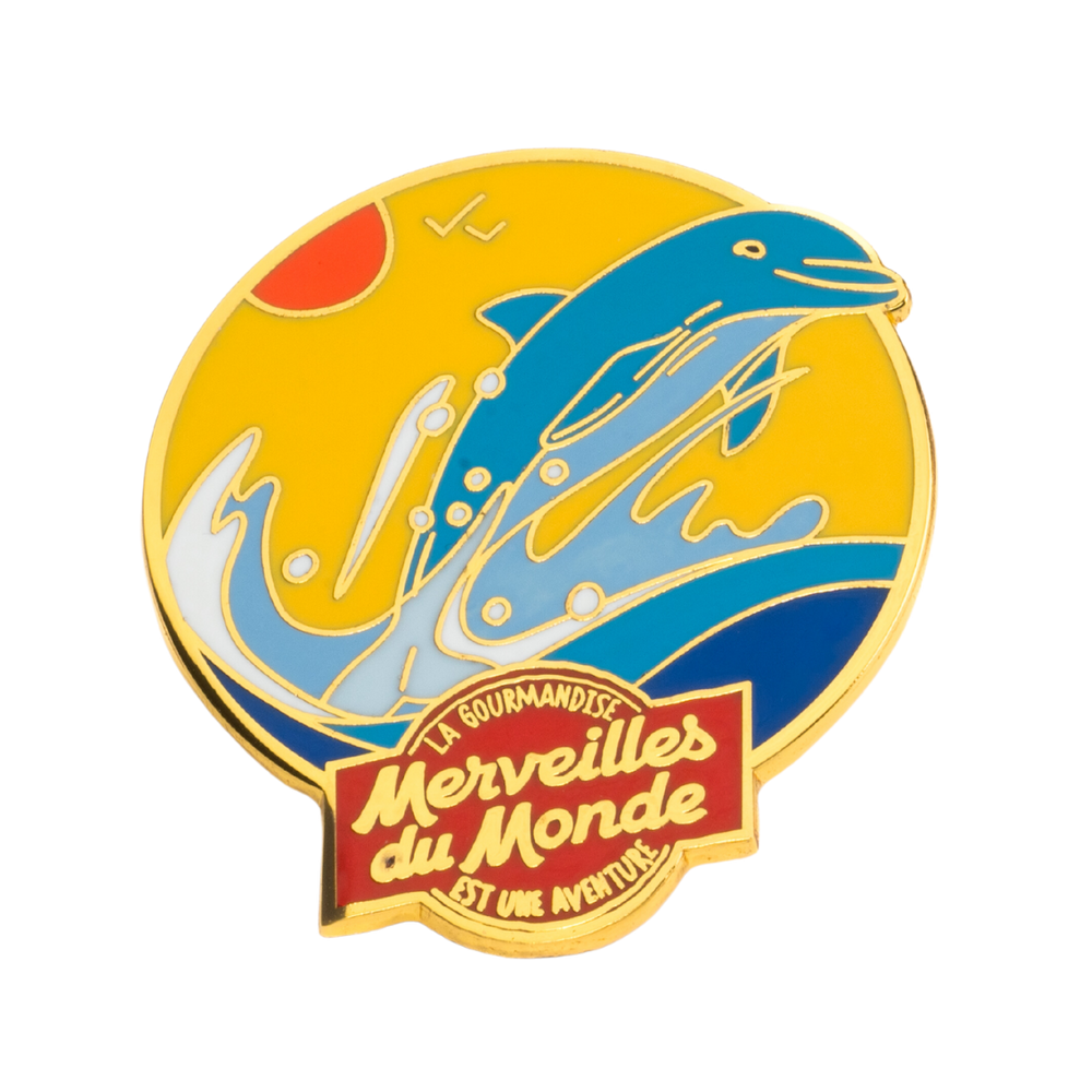 Pin's collector Merveilles du Monde avec un dauphin.