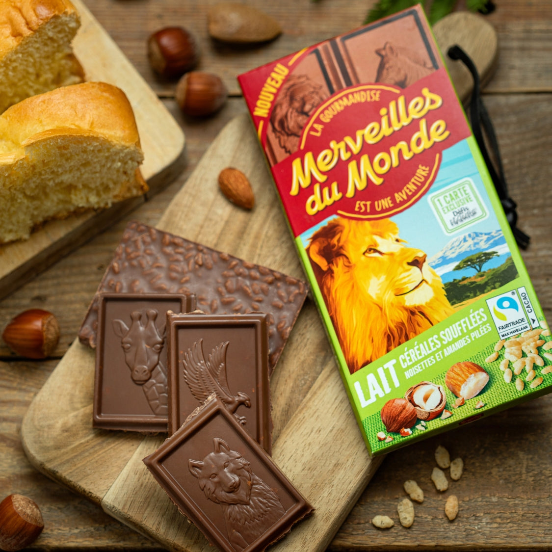
                  
                    Tablette de chocolat au lait Merveilles du Monde, aux éclats de céréales soufflées noisettes et amandes pilées.
                  
                