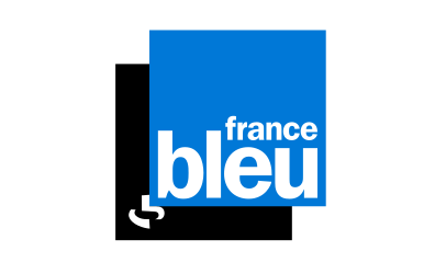 Logo France Bleu, communiquant sur la marque de chocolat Merveilles du Monde